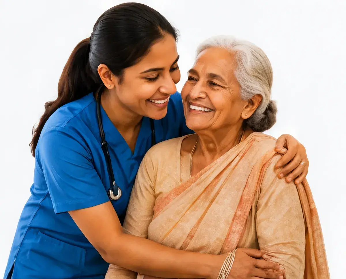 Compassionate caregiver assisting an elderly resident at Vishwa Old Age Home.